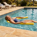 Colourful swimming pool noodles made from EVA foam
