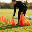 Set of vibrant football training cones in various sizes and colours