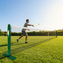 Pickleball posts with base plates in blue, black, and green for club use