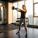 Cast iron kettlebell in various sizes and colours for gym workouts