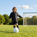 Kids' windbreaker jacket in black and navy for outdoor and sports use